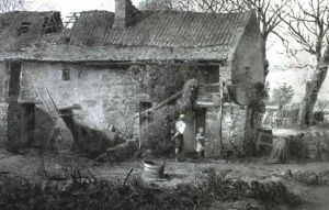 Figures In A Rustic Barn by Theodore Rousseau