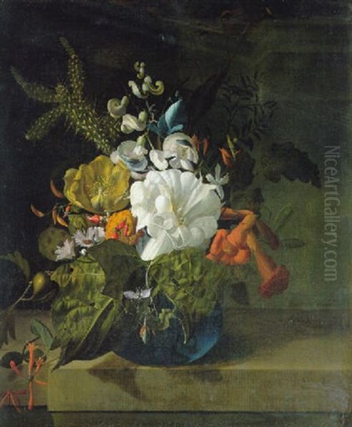 Margurites, A Cactus, Jasmine And Other Flowers In A Glass Vase On A Ledge - view 1
