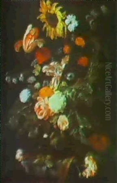 An Arrangement Of Tulips, Roses, A Sunflower, A Carnation And Other Flowers In A Vase On A Stone Ledge - view 1