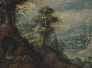 A Mountainous Wooded Landscape, A Town Beyond by Marten Ryckaert