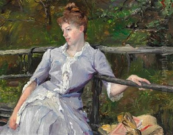 Young Woman In A Lilac Dress Sitting On A Bench In The Garden - view 1