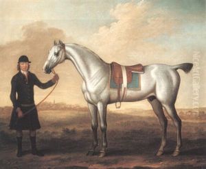 A Grey Racehorse Held By A Groom