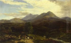 An Extensive Welsh Landscape With Cattle In The Foreground
