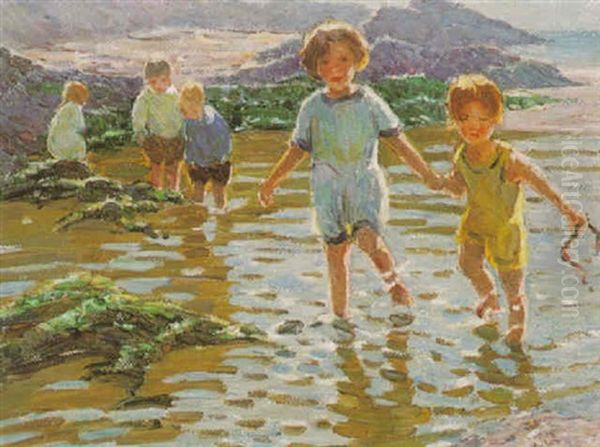 Children Playing In A Rockpool - view 1