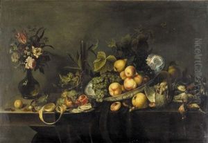 Still Life Of Peaches And Grapes In A Porcelain Dish, A Partly Peeled Lemon, An Open Pomegranate And Loose Cherries, Along With Dead Game, Oysters And Hazelnuts, All Arranged On A Partly Draped Table