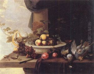 Fruit In A Porcelain Bowl, A Peeled Lemon In A Roemer, A Wine Glass, A Knife, Roses, Grapes And Game Birds On A Ledge by Michiel Simons