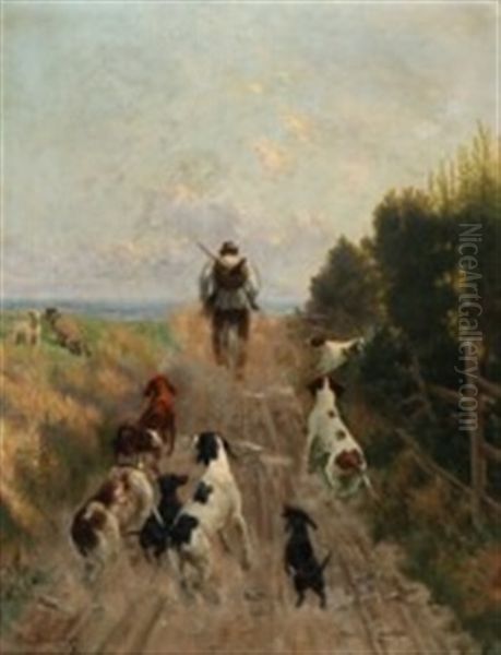 A Hunter Cycling Along With His Dogs - view 1