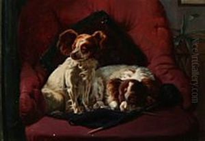 Two Dogs Resting In An Easy Chair