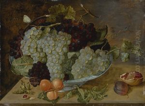 Still Life Of Grapes, Peaches, And A Pomegranate On Stone Ledge by Isaac Soreau