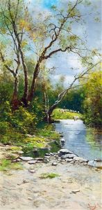 Sheep Grazing On The Riverbank