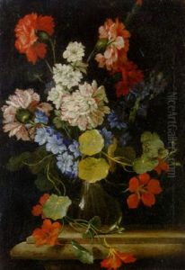 Carnations, Nasturtiums And Other Flowers In A Vase On A Stone Ledge