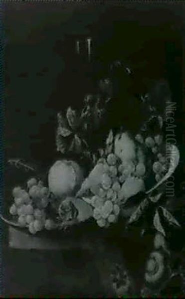 A Still Life Of Fruit And A Glass Of Wine Arranged On A     Table Draped With A Rug - view 1