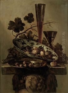 A Porcelain Bowl With Walnuts, A Pewter Dish With Hazelnuts And A 'facon De Venise', All On A Cherub Styled Pedestal by Abraham Susenier