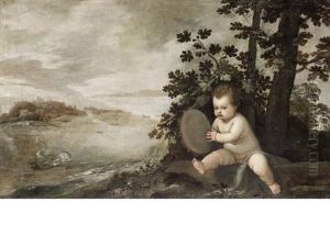 An Infant Holding A Tambourine