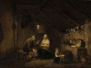 A Peasant Family In A Kitchen Interior by Juliaen Teniers the Younger