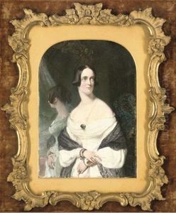A Young Lady, In Sprigged White Dress With Black Lace Stole Over Her Arms, Gold Brooch At Corsage, Gold Bracelets And Rings, Her Dark Hair Upswept In A Plait; Her Reflection In A Gilded Mirror by Robert Thorburn