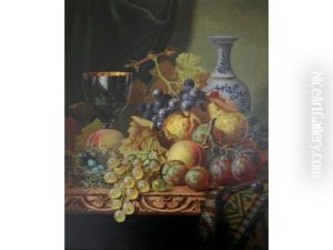 Still Life Of Fruits, A Bird's Nest And A Goblet Upon A Draped Table by Henry George Todd