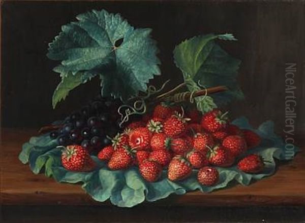 Strawberries And Blue Grapes On A Rhubarb Leaf - view 1