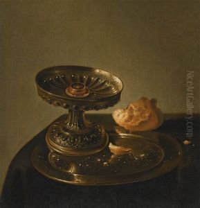 A Still Life Of A Silver Tazza And A Bread Roll On A Pewter Plate