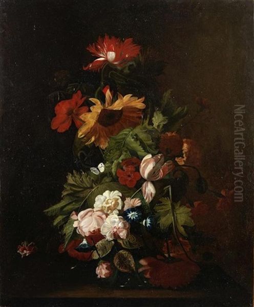 A Sunflower, Tulips, Roses And Other Flowers In A Glass Vase On A Table-top - view 1