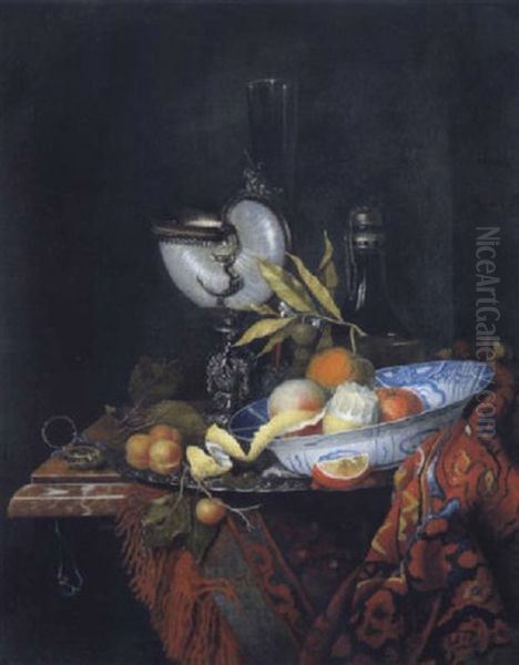 Stilleben Mit Einer Silberplatte Mit Marillen, Einer Delfter Schale Mit Zitrusfruchten, Einem Nautiluspokal Und Einem Stangenglas Auf Einem Orientteppich - view 1