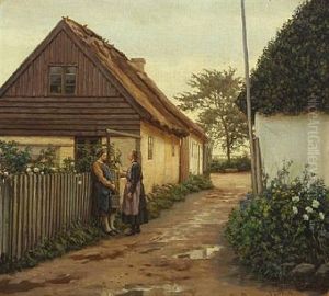 Two Women Having A Conversation In A Village