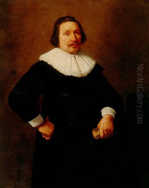 Portrait Of A Man Holding A Glove - view 1