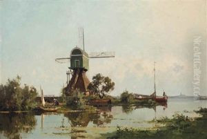 A Windmill In A Serene Landscape by Cornelis Vreedenburgh