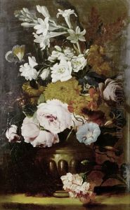 Roses, Jasmine, Primroses And Other Flowers Inan Urn On A Table Top