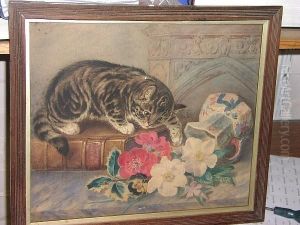 Tabby Kitten Sitting On A Natural History Book, Playing With A Vase Of Flowers by J.M. Burbank