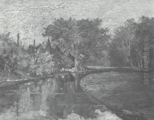 Stream bordered by wooded landscape