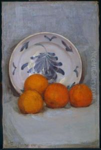 Oranges and decorated plate