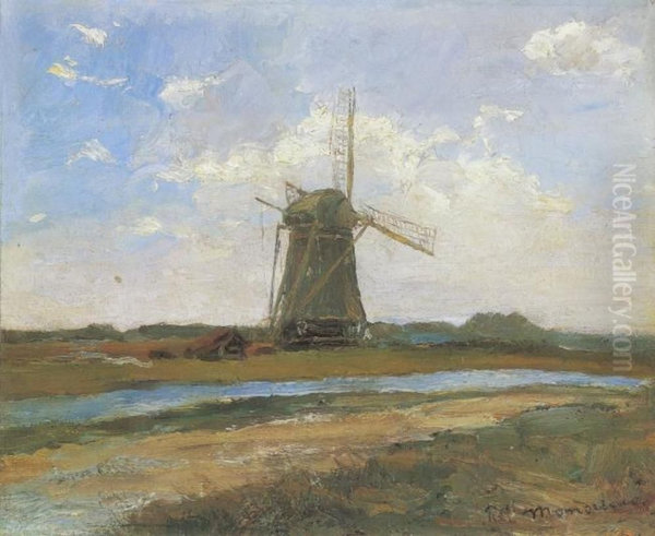 Windmill in sunlight near a stream - view 1