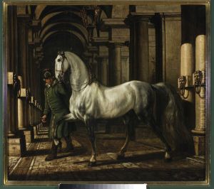 Stable boy leading a horse
