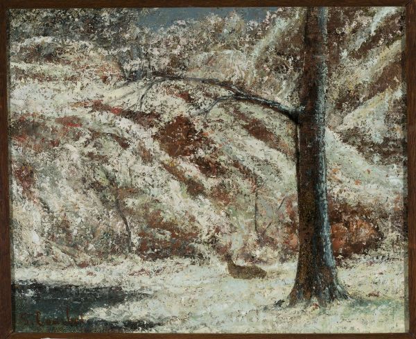 Fawn in the snow in the woods - view 1