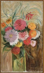 Zinnias and asters in a glass jar