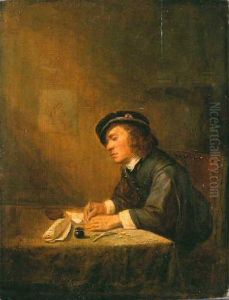 Young man sitting indoors, writing
