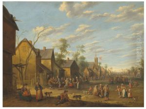 A village with peasants merrymaking outside a tavern