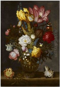 A still life of white and red roses, a tulip, anemones, a hyacinth, a pansy, lily-of-the-valley, and other flowers in an ornamented glass vase on a hard-stone ledge, with a shell, a bluebottle and a Red Admiral butterfly by Ambrosius Bosschaert