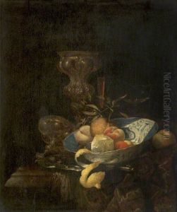 Still life with columbine cup, porcelain bowl with fruit and glasses by Willem Kalf
