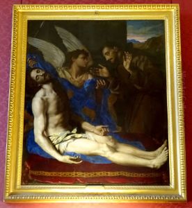 Un ange montre a saint Francois d'Assise le Christ detache de la croix by Alessandro Allori