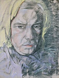 Portrait of a man with a headscarf