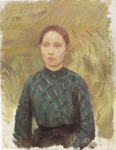 Young woman in a green dress,  sitting in the dunes