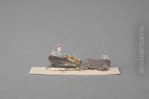 Santa Claus figure in grey, in a sledge dragged by a deer [one of 36 figures] by Ivar Arosenius