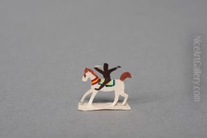 Black figure riding on a white horse [one of 36 figures]
