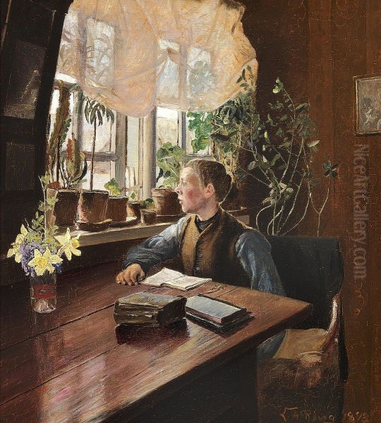 A boy doing his homework. - view 1