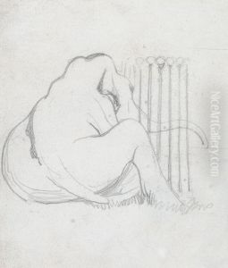 A Baby Elephant sitting by a fence