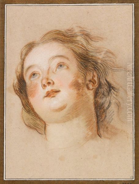 Girl with flowing hair looking upwards - view 1