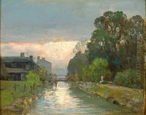 A boy fishing by a river.