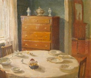 A dinner table. by Axel Johansen